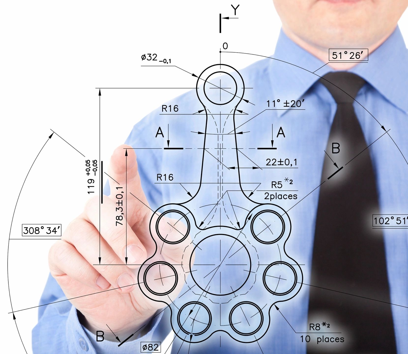 Engineer with technical blueprint